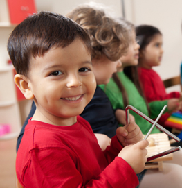 Young child at the piano in NTPPA's preparatory program